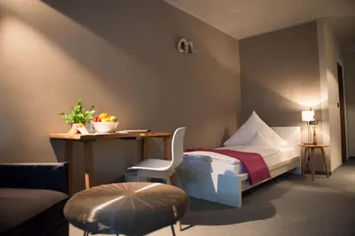 Ein Sitzbereich in der Unterkunft Hotel Restaurant Brigitte