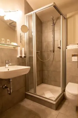 Ein Badezimmer in der Unterkunft Hotel Restaurant Brigitte