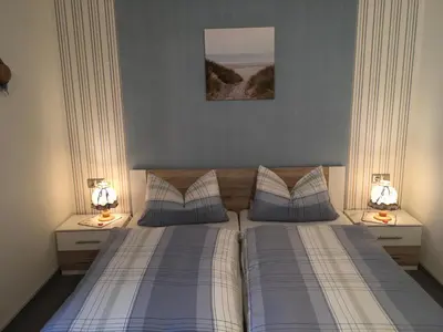Ein Bett oder Betten in einem Zimmer der Unterkunft Pension Haus Wanninger