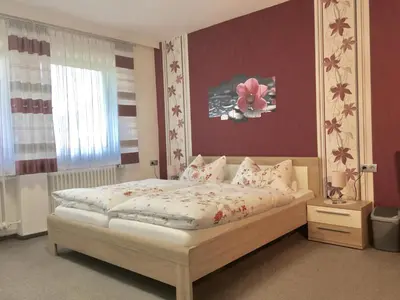 Ein Bett oder Betten in einem Zimmer der Unterkunft Pension Haus Wanninger