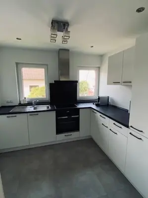 Küche/Küchenzeile in der Unterkunft Moderne und stilvolle 3 Zimmer Wohnung