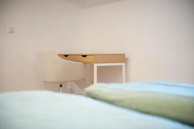 Ein Bett oder Betten in einem Zimmer der Unterkunft Schloßberg - Ferienwohnung im Herzen von Selb