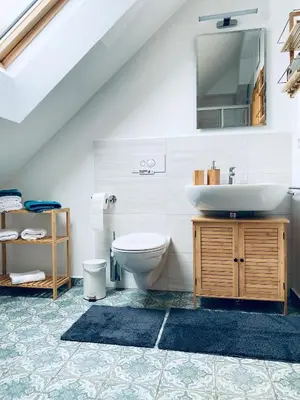 Ein Badezimmer in der Unterkunft Destino in der ehemaligen Waage der Roomerie