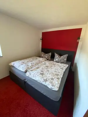 Ein Bett oder Betten in einem Zimmer der Unterkunft Ferienhaus in Schönheide im schönen Erzgebirge