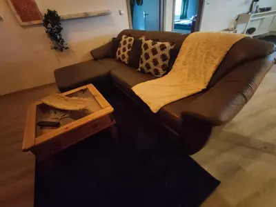 Ein Sitzbereich in der Unterkunft Ferienwohnung zum Getreidelager