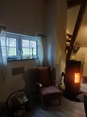 Ein Sitzbereich in der Unterkunft Ferienwohnung zum Getreidelager