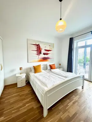 Ein Bett oder Betten in einem Zimmer der Unterkunft Cooles City-Appartment - Balkon