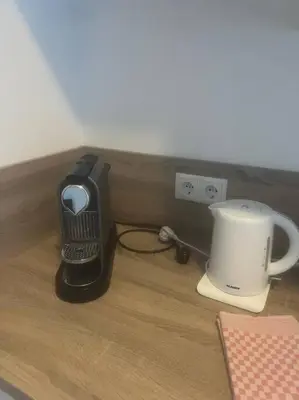 Kaffee-/Teezubehör in der Unterkunft Cooles City-Appartment - Balkon