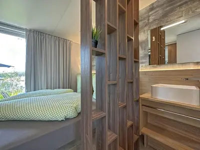 Ein Bett oder Betten in einem Zimmer der Unterkunft Tiny House, Neunburg vorm Wald