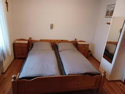Ein Bett oder Betten in einem Zimmer der Unterkunft Zum Bergbauern