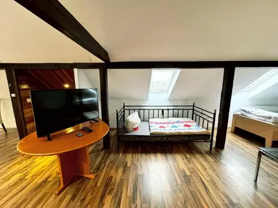 Ein Bett oder Betten in einem Zimmer der Unterkunft City Apartments in Hof