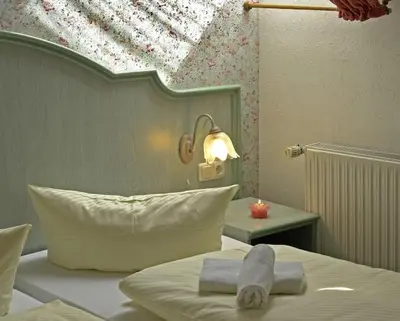 Ein Bett oder Betten in einem Zimmer der Unterkunft Rathaushotel