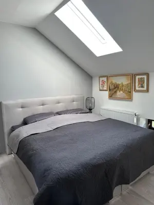 Ein Bett oder Betten in einem Zimmer der Unterkunft Zwillinge Ferienwohnung am Markt