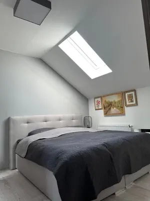 Ein Bett oder Betten in einem Zimmer der Unterkunft Zwillinge Ferienwohnung am Markt