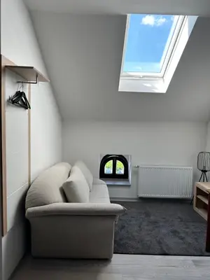 Ein Sitzbereich in der Unterkunft Zwillinge Ferienwohnung am Markt