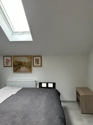 Ein Bett oder Betten in einem Zimmer der Unterkunft Zwillinge Ferienwohnung am Markt