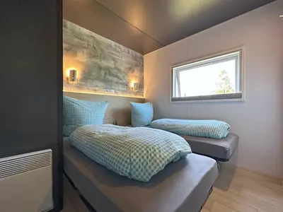Ein Bett oder Betten in einem Zimmer der Unterkunft Tiny House, Neunburg vorm Wald