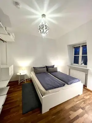 Ein Bett oder Betten in einem Zimmer der Unterkunft Zentrales City-Appartment