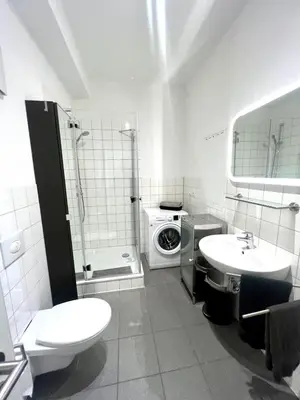 Ein Badezimmer in der Unterkunft Zentrales City-Appartment