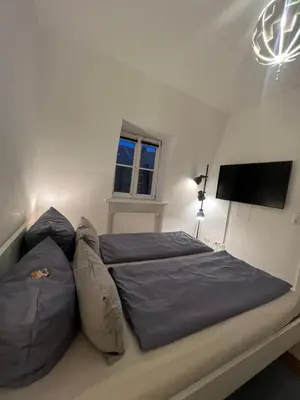 Ein Bett oder Betten in einem Zimmer der Unterkunft Zentrales City-Appartment