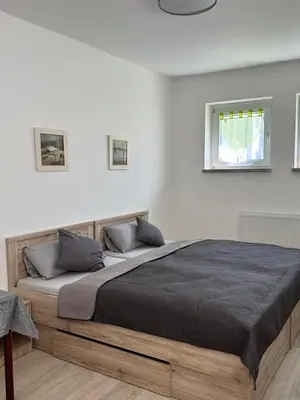 Ein Bett oder Betten in einem Zimmer der Unterkunft Ein Zimmer Wohnung am Markt