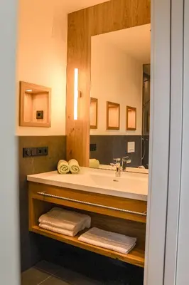 Ein Badezimmer in der Unterkunft Höra‘s Apartments Hammerbergblick