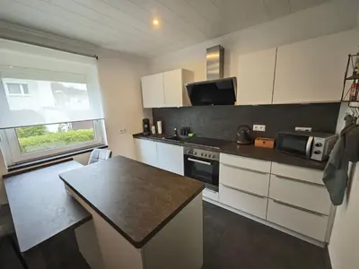 Küche/Küchenzeile in der Unterkunft FH-Nähe: Modernes Apt mit Balkon