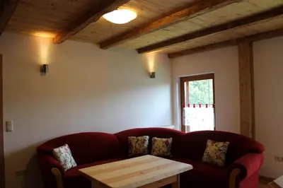 Ein Sitzbereich in der Unterkunft Gästehaus zum Prinzenfelsen