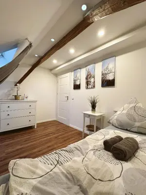 Ein Bett oder Betten in einem Zimmer der Unterkunft Ferienwohnung Samy