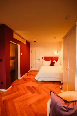 Ein Bett oder Betten in einem Zimmer der Unterkunft Der Schwarzbau - Luxus Ferienhaus und Ferienwohnung