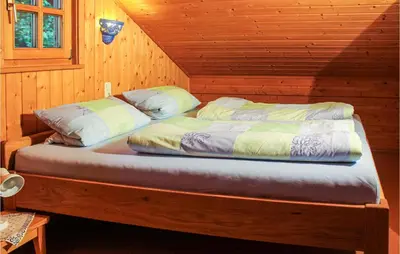 Ein Bett oder Betten in einem Zimmer der Unterkunft Awesome Home In Waldmünchen With Wifi