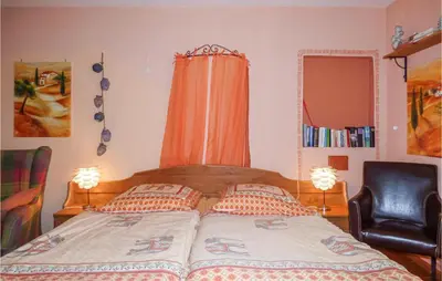 Ein Bett oder Betten in einem Zimmer der Unterkunft Ferienhaus Alex