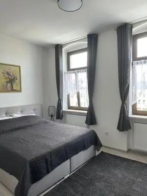 Ein Bett oder Betten in einem Zimmer der Unterkunft Zweizimmerwohnung am Markt
