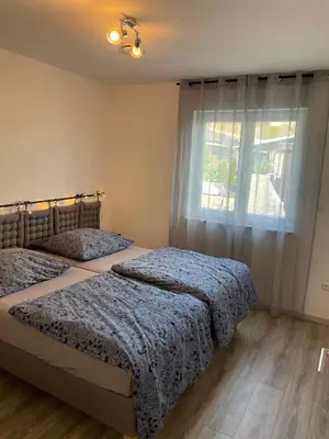 Ein Bett oder Betten in einem Zimmer der Unterkunft Ferienhaus Münchshofen