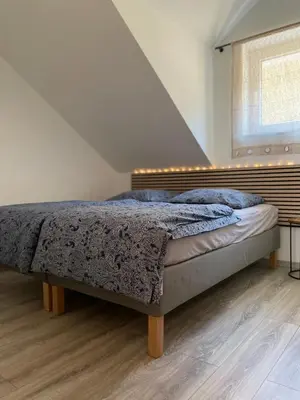 Ein Bett oder Betten in einem Zimmer der Unterkunft Ferienhaus Münchshofen