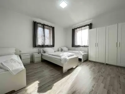 Ein Bett oder Betten in einem Zimmer der Unterkunft SAD104 - Moderne Monteurwohnung/Übergangswohnung