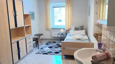 Ein Bett oder Betten in einem Zimmer der Unterkunft Ferienwohnung Oberschieda