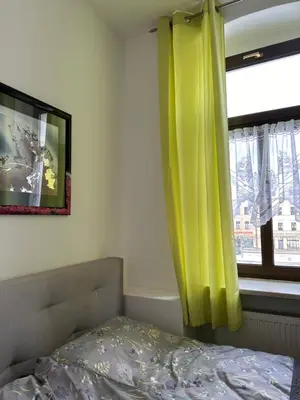 Ein Bett oder Betten in einem Zimmer der Unterkunft Kleinzimmer am Markt
