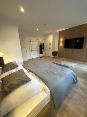 Ein Bett oder Betten in einem Zimmer der Unterkunft Stilvolle Wohnung in Bestlage