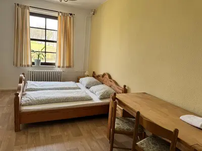 Ein Bett oder Betten in einem Zimmer der Unterkunft Landgasthof & Hotel Waldeck