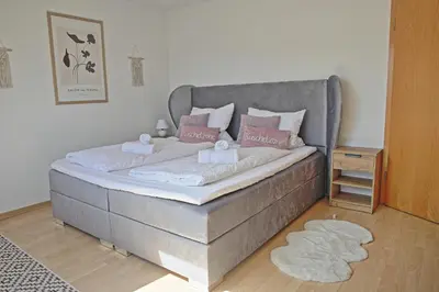Ein Bett oder Betten in einem Zimmer der Unterkunft TheRetreat - gemütlich und modern