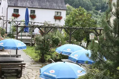 Ein Garten an der Unterkunft Wellness Hotel Pension & Gaststätte Riedel