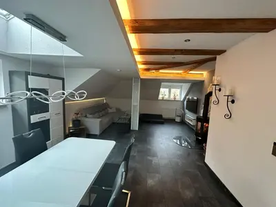 Ein Bett oder Betten in einem Zimmer der Unterkunft Ferienwohnung Parkblick