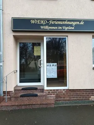 Ein Zertifikat, Auszeichnung, Logo oder anderes Dokument, das in der Unterkunft FeWo Wieko Plauen Leibnizstr. H1, 2.OG rechts ausgestellt ist