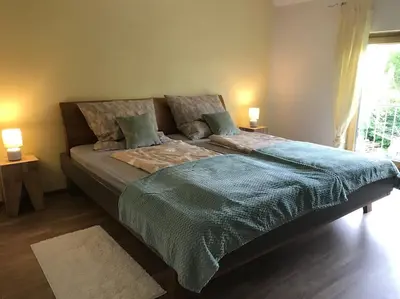 Ein Bett oder Betten in einem Zimmer der Unterkunft Apartment am See