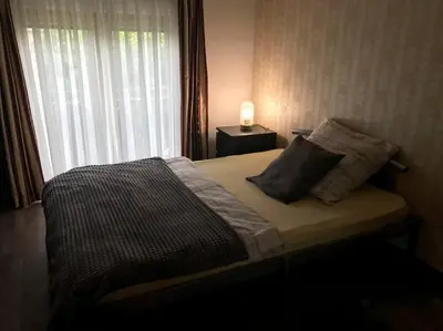 Ein Bett oder Betten in einem Zimmer der Unterkunft Apartment am See
