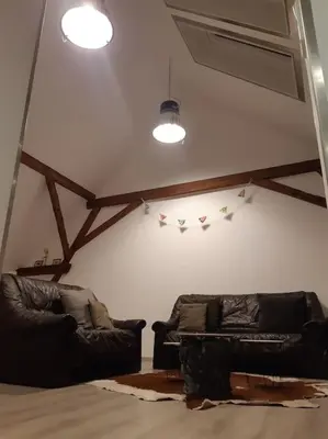 Ein Sitzbereich in der Unterkunft Apartment am See