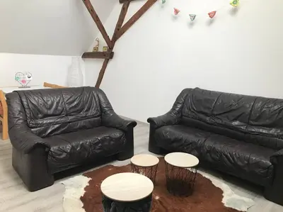 Ein Sitzbereich in der Unterkunft Apartment am See