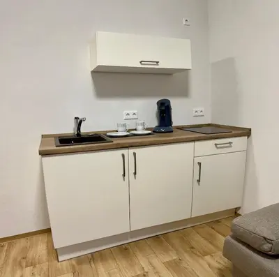 Küche/Küchenzeile in der Unterkunft ANNA Gästehaus Zimmer