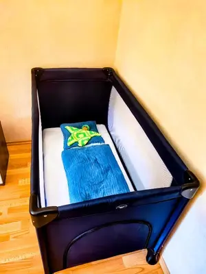 Ein Bett oder Betten in einem Zimmer der Unterkunft FeWo Ulbrich Langenstadt